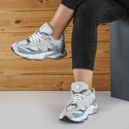 کفش و کتانی زنانه و دخترانه چرم طبیعی مدل نیوبالانس 9060 NEW BALANCE رنگ طوسی آبی کد 8974